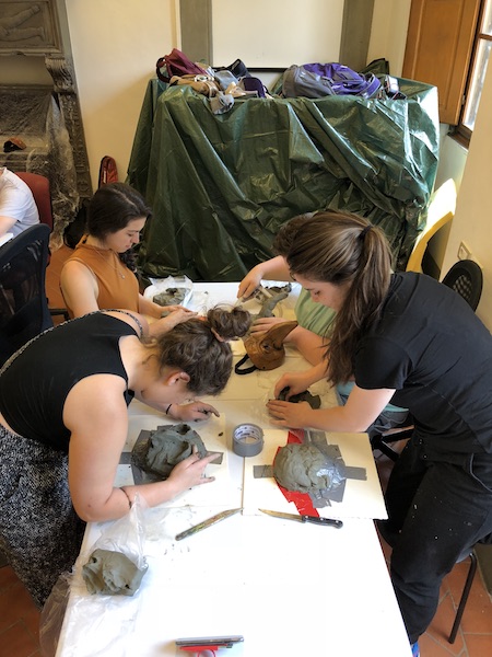 Commedia dell'Arte students creating their own original masks.